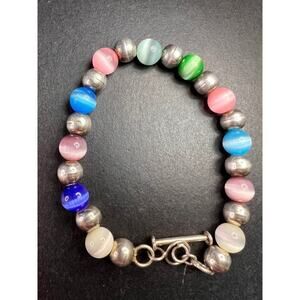 Vintage sterling silver and cats eye glass toggle bracelet